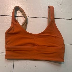 Reversible orange and green Lululemon sports bra